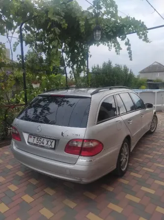 Mercedes E-Class 2004 год Суклея Суклея