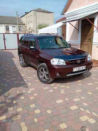 Mazda Tribute 2002 год Парканы Парканы