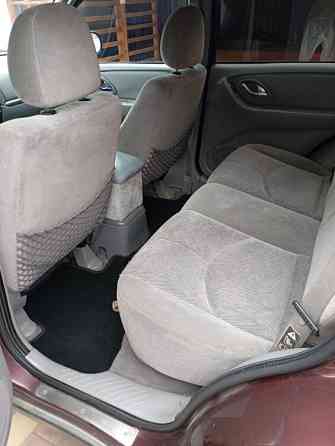 Mazda Tribute 2002 год Парканы Парканы