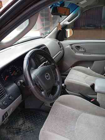 Mazda Tribute 2002 год Парканы Парканы