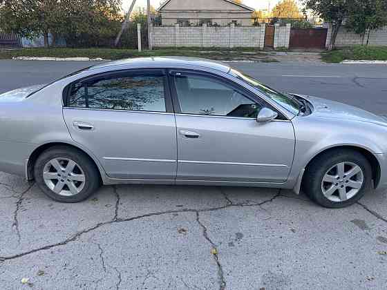 Nissan Altima 2002 год Парканы Парканы