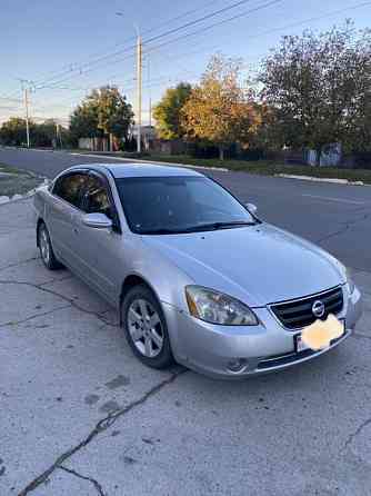Nissan Altima 2002 год Парканы Парканы