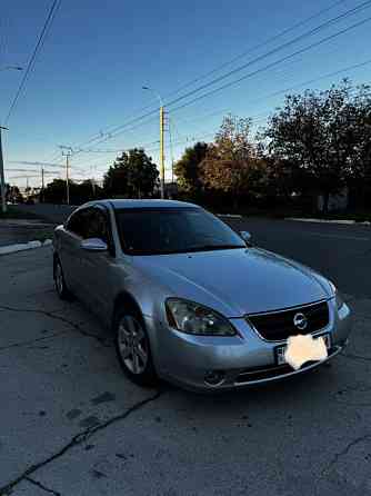 Nissan Altima 2002 год Парканы Парканы