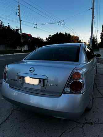 Nissan Altima 2002 год Парканы Парканы