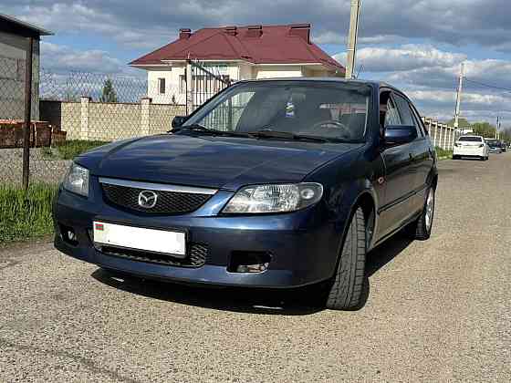 Mazda 323 2002 год Парканы Парканы