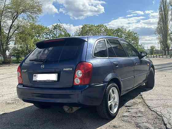 Mazda 323 2002 год Парканы Парканы